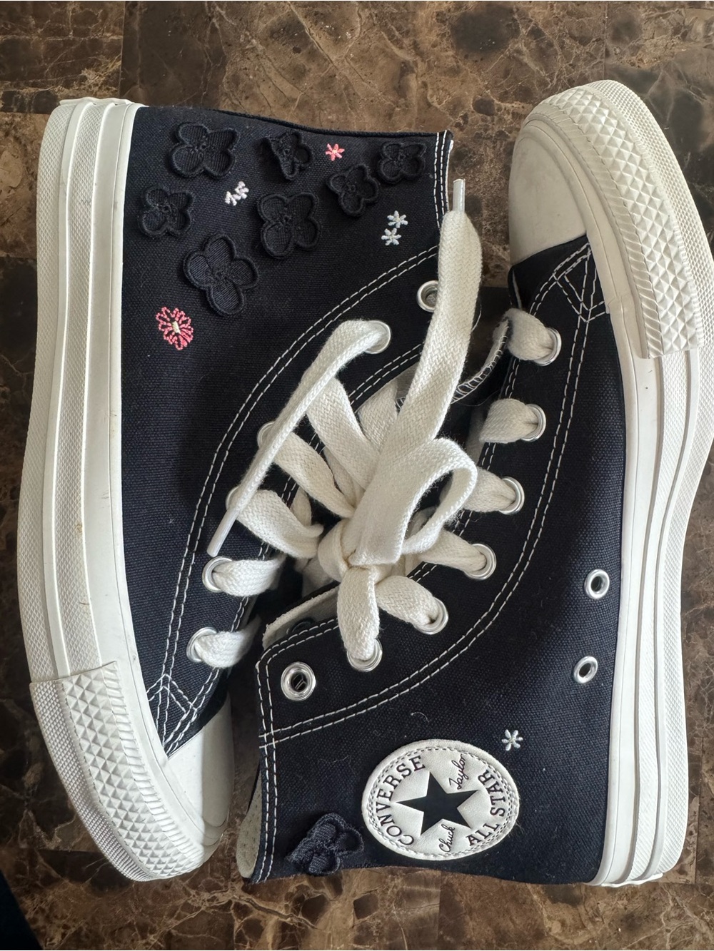 Converse women Black High-Top Sneakers with White Soles and Pink Floral Accents